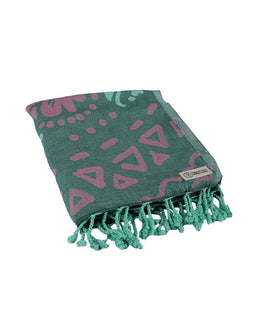 Green patterned towel with pink designs on a white background