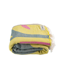 Folded towel with colorful stripes on a white background