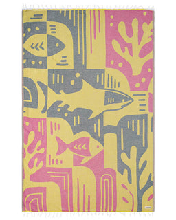 Colorful towel with fish and coral pattern on a white background