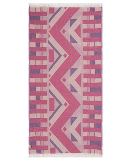 Pink and purple patterned towel on a white background