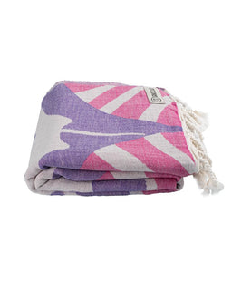 Folded towel with purple, pink, and white pattern on a white background