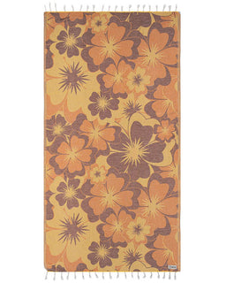 Floral patterned towel with orange and brown colors on a white background