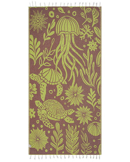 Towel with green jellyfish and turtle design on a brown background