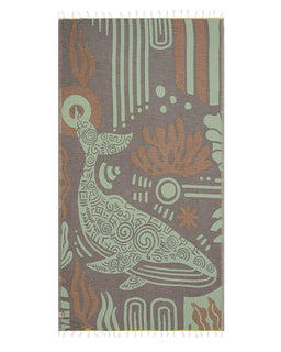 Towel with abstract fish design on a brown background
