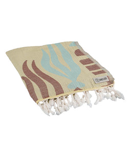 Beige towel with brown and blue wave patterns and white tassels on a white background