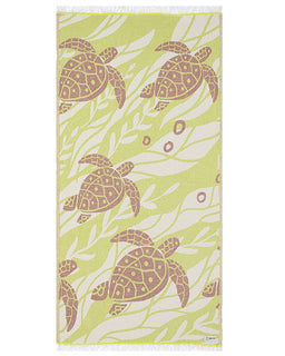 Towel with turtle pattern on a green background