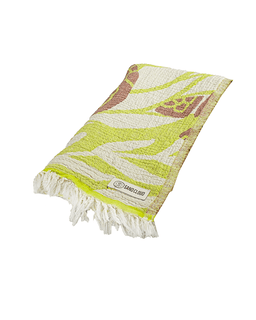 Green and white patterned towel with brand logo on a white background