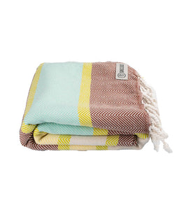 Colorful striped towel with tassels on a white background