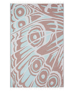 Patterned towel with abstract design on a white background
