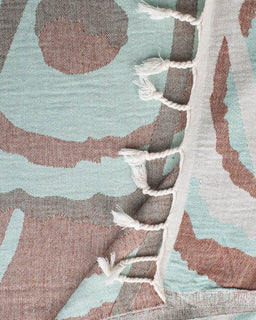 Close-up of a textured fabric with a patterned design