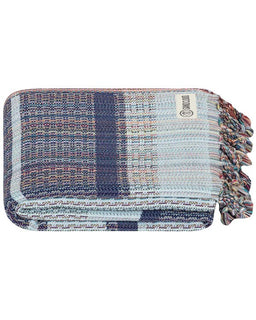 Multicolored woven towel with tassels on a white background