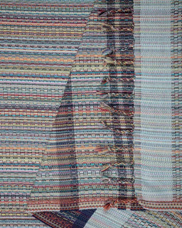 Multicolored striped towel with a textured pattern