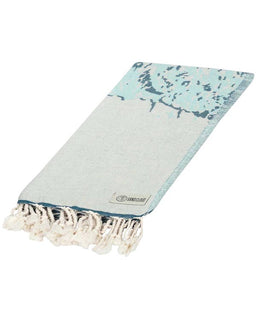 Light blue towel with white tassels on a white background