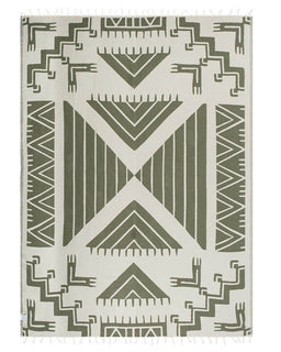 Geometric patterned blanket with green and beige design on a white background