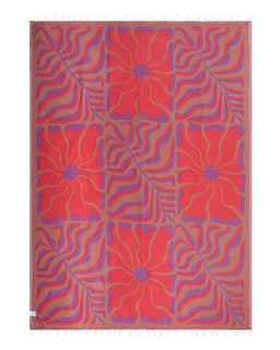 Rug with pink and purple floral pattern on a white background