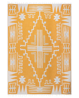 Yellow and white patterned blanket with geometric design