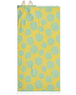 Yellow towel with green lime pattern on a white background
