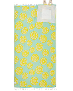 Beach towel with lemon pattern on a light blue background