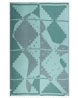 Teal and gray geometric patterned towel on a white background