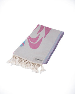 Folded towel with pink logo on a white background