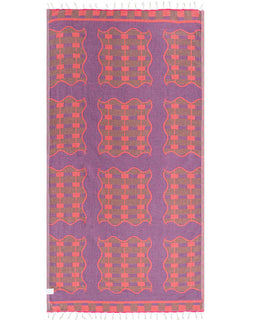 Patterned towel with geometric design on a white background