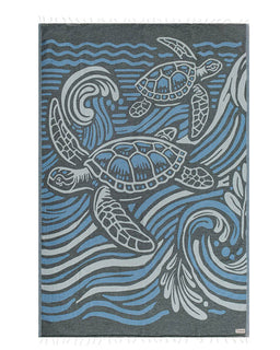 Towel with turtle and wave design in blue and gray