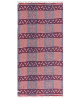 Patterned towel with geometric design on a white background