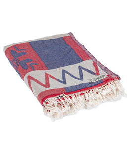 Towel with red, blue, and white pattern on a white background