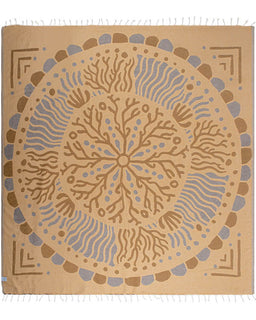 Decorative towel with a circular pattern on a beige background