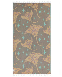 Towel with devil ray and diamond pattern on a gray background