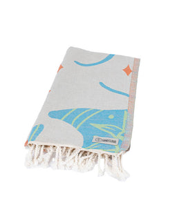 Towel with shark design and brand logo on a white background