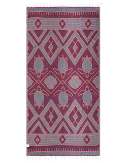 Patterned towel with turtle design on a white background