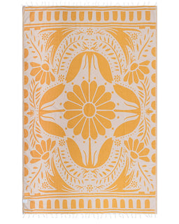 Yellow and white patterned towel with floral design on a white background