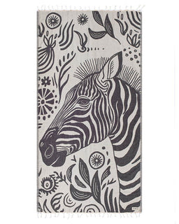 Towel with zebra design and abstract patterns on a white background