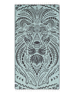 Teal towel with a lion head design on a white background