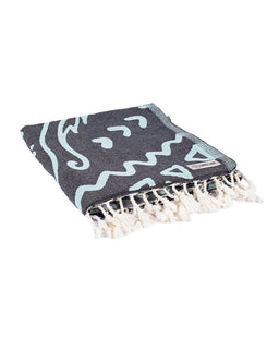 Gray towel with white and light blue pattern on a white background