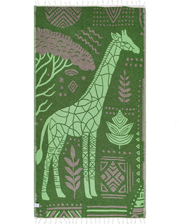 Green towel with giraffe and geometric pattern on a white background