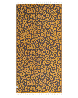 Towel with yellow cheetah print pattern on a white background