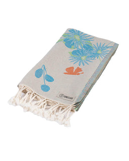 Beige towel with florals on a white background