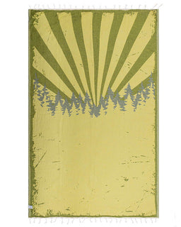 towel with sunburst pattern and tree silhouettes on a white background