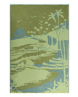 towel with a tropical landscape design featuring palm trees and a sunset.