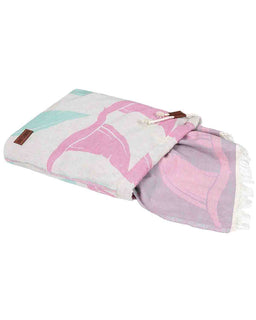 Folded towel with pink and white abstract design on a white background