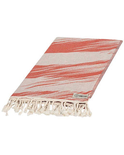 Red and white striped towel with tassels on a white background