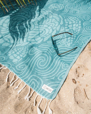 Close up view of the swirl turtle towel